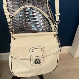 Coach 70th year anniversary purse, colorful lined inside.